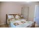 Comfortable bedroom featuring a decorative bedspread and storage at 4143 E Maiden Rd, Maiden, NC 28650
