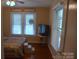 Bright bedroom with natural light, hardwood floors, and a comfortable bed at 4143 E Maiden Rd, Maiden, NC 28650