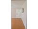 Entryway with hardwood floors, front door, and a round mirror on the wall at 4143 E Maiden Rd, Maiden, NC 28650