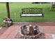 Fire pit area with detailed swing bench, great for entertaining and relaxing outdoors at 4143 E Maiden Rd, Maiden, NC 28650