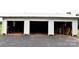 Detached three-car garage with open doors, providing ample storage and parking at 4143 E Maiden Rd, Maiden, NC 28650