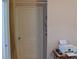 Hallway with closet and curtain leading to additional room; printer on table at 4143 E Maiden Rd, Maiden, NC 28650