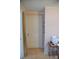 Hallway with closet and curtain leading to additional room; printer on table at 4143 E Maiden Rd, Maiden, NC 28650