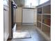 View of kitchen cabinets, floor, and appliances with an oven and dishwasher at 4143 E Maiden Rd, Maiden, NC 28650