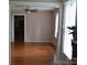 Bright living room boasts hardwood floors and natural light at 4143 E Maiden Rd, Maiden, NC 28650