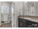 Bathroom featuring granite countertops and dark cabinetry at 4210 Holly Ne Cir, Conover, NC 28613