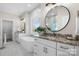 This bright bathroom features a soaking tub, granite countertops, and double sinks at 4210 Holly Ne Cir, Conover, NC 28613