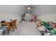 Spacious upper level bonus room featuring neutral carpet, ceiling fan, and dormer window at 4210 Holly Ne Cir, Conover, NC 28613
