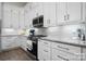 Charming kitchen with granite counters, stainless steel appliances, subway tile backsplash, and ample cabinet space at 4210 Holly Ne Cir, Conover, NC 28613