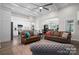 Bright, open-concept living room flows into kitchen with hardwood floors and a neutral color palette at 4210 Holly Ne Cir, Conover, NC 28613