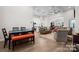 Open-concept floor plan with a living room, kitchen, dining area, and hardwood floors at 4210 Holly Ne Cir, Conover, NC 28613