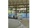 View from the Tennis Pavillion overlooking well-maintained tennis courts at 4210 Holly Ne Cir, Conover, NC 28613