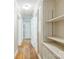 Hallway with hardwood floors and access to multiple rooms at 4699 Cherrystone Rd, Lancaster, SC 29720