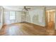 Bright living room with large window and hardwood floors at 4699 Cherrystone Rd, Lancaster, SC 29720