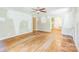 Spacious living room with hardwood floors and ceiling fan at 4699 Cherrystone Rd, Lancaster, SC 29720