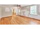 Large living room featuring hardwood floors and natural light; perfect for gatherings and customization at 4699 Cherrystone Rd, Lancaster, SC 29720