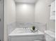 Luxurious soaking tub is tiled and perfect for unwinding after a long day at 4708 S Hill View Dr, Charlotte, NC 28210