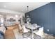 Open-concept dining room with stylish decor and an adjacent modern kitchen at 622 Station St # 48, Clover, SC 29710
