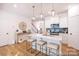 Well-lit kitchen featuring pendant lighting, stainless appliances, a kitchen island and bar stool seating at 622 Station St # 48, Clover, SC 29710