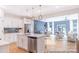 Modern kitchen with stainless steel appliances, center island with pendant lighting, and open dining area at 622 Station St # 48, Clover, SC 29710