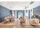 Open-concept living and dining area with modern decor, stylish furniture, and ample natural light at 622 Station St # 48, Clover, SC 29710