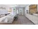 Bright main bedroom featuring neutral tones, large windows, and modern decor for a serene and inviting space at 622 Station St # 48, Clover, SC 29710