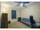 Cozy bedroom featuring a sofa, ceiling fan and ample space at 6785 Knotty Wood Ln, Vale, NC 28168