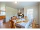 Inviting dining room features hardwood floors and lovely natural light at 6785 Knotty Wood Ln, Vale, NC 28168