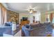 Inviting living room featuring a cozy fireplace, comfortable seating, and hardwood flooring at 6785 Knotty Wood Ln, Vale, NC 28168
