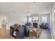Living room with fireplace and large windows at 6907 Hunts Mesa Dr, Fort Mill, SC 29707
