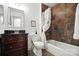 Bathroom featuring a shower-tub combination, modern vanity, and fixtures at 9334 New Towne Dr, Matthews, NC 28105