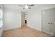Bedroom featuring wood floors, closet space, and natural light at 9334 New Towne Dr, Matthews, NC 28105