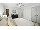 Bedroom featuring a comfortable bed, dresser, and ample closet space at 9334 New Towne Dr, Matthews, NC 28105
