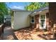 This deck is spacious and is made of wood and features a brick exterior at 9334 New Towne Dr, Matthews, NC 28105