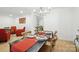 A dining room featuring a modern table setting and hardwood floors at 9334 New Towne Dr, Matthews, NC 28105