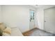 This mud room features a bench, storage and a door to the exterior at 9334 New Towne Dr, Matthews, NC 28105