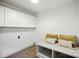 Room with built-in storage and shelving and bright lighting at 9334 New Towne Dr, Matthews, NC 28105