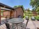 Backyard deck with outdoor seating, and a brick home creating an inviting outdoor living space at 112 8Th Nw Ave, Hickory, NC 28601