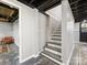 This finished basement has painted concrete floors and painted ceilings at 112 8Th Nw Ave, Hickory, NC 28601