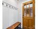 Entryway with hooks, bench, and a glass paneled door at 112 8Th Nw Ave, Hickory, NC 28601