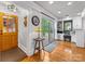 Mud room with wooden floors, access to the exterior, and a small office space at 112 8Th Nw Ave, Hickory, NC 28601