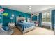 Bedroom with an accent wall, carpeting, a window, and modern decor at 1216 Catawba Run, Lowell, NC 28098