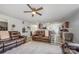 Open-concept living space with modern furniture and an easy flow to the kitchen at 1216 Catawba Run, Lowell, NC 28098