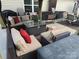 Cozy outdoor patio with stylish seating, a fire pit table, and charming decor at 1216 Catawba Run, Lowell, NC 28098