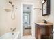 Cozy bathroom featuring a shower over tub, and traditional vanity at 127 Bristol Rd, Statesville, NC 28677