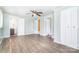 Spacious bedroom with wood-look floors and ample closet space, featuring a ceiling fan at 127 Bristol Rd, Statesville, NC 28677