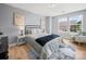 Bedroom with natural light, stylish lamps, and a cozy rug at 1307 Farm Branch Sw Dr, Concord, NC 28027