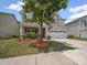 Charming two-story home with a well-manicured lawn and a two car garage and lovely stone accents at 1307 Farm Branch Sw Dr, Concord, NC 28027