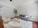 Bright living room with modern decor, comfortable seating, and hardwood floors at 1307 Farm Branch Sw Dr, Concord, NC 28027