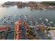 Aerial view of condo complex with marina, boat slips, and ample parking at 17811 Half Moon Ln # E, Cornelius, NC 28031
